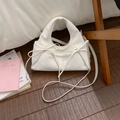 Elegant white pleated dumpling bag with bow detail and adjustable shoulder strap - White