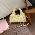 Chic cream bow shoulder bag with pleated ruffles and versatile adjustable strap - Creamy Yellow