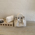 Minimalist beige canvas bucket bag set with matching smooth leather cosmetic pouch - No Pendant / White