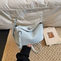 Minimalist sky blue bucket bag with metal lock and adjustable shoulder strap for women - Blue