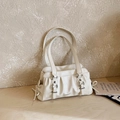 Elegante borsa a spalla plissettata crema con fibbie metalliche e fiocchi laterali - Bianco