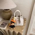 Cream bucket bag in woven canvas with puppy charm and leather handles stylish - With Pendant / White
