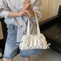 Chic off-white pleated Boston bag with buckle straps and side drawstring bows - Off White