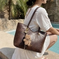 Deep brown faux leather tote bag with long shoulder strap and plush bear charm - Coffee with Pendant