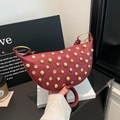 Burgundy moon shoulder bag with gold metal studs and grommet details for women - Red