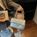 Elegant silver quilted crossbody bag with gold chain strap and metallic finish - Silver