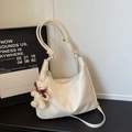 Cream white leather hobo bag with structured stitching and a cute teddy bear charm - White With Pendant