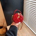 Mini round red crossbody bag with quilted embroidery and gold camellia flower clasp - Red