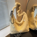 Fuzzy ginger yellow shoulder bag with star patch and wavy strap for casual wear - Style 1