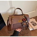 Detail view of brown vintage tote bag showing textured weaving and gold twist-lock closure - Coffee (With Pendant)