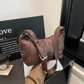 Vintage coffee brown dumpling bag with lychee texture leather and silver buckle - Brown