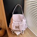 Mochila minimalista rosa lila claro con hebilla de lazo dorado y cierre de cordón - Rosa