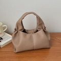 Minimalist khaki leather dumpling handbag with wide handle and gold metallic buckles - Khaki