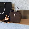 Vintage dark brown bucket bag with cross lock, puppy charm and long strap - With Pendant / Brown