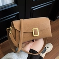 Caramel brown litchi leather crossbody bag with minimalist gold buckle and flap design - Khaki