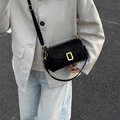 Classic black leather crossbody baguette bag with gold buckle and adjustable wide strap - Black