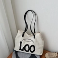 Borsa tote in tela bianco sporco con spalline in pelle nera e stampa artistica LOO - Tela Nera