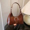 Bolso hobo retro de cuero sintético marrón caramelo con una hebilla de metal plateado - Marrón