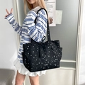 Fashionable black canvas tote bag with white star pattern and side pocket for commuting - Black