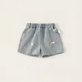 Mädchen Jeansshorts in Hellblau mit eleganten Perlen und dekorativen Schleifen - Denim-Blau / 80