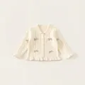 Cardigan in maglia panna per bambina con trama traforata e fiocchi viola applicati - Albicocca / 90