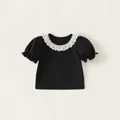 Girls black cotton t-shirt featuring elegant white lace ruffle collar and puffed sleeves - 150 / Black