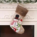 Linen Christmas stocking with snowman embroidery hanging on a classic white fireplace mantle - Snowman Design