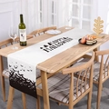 Halloween table runner featuring black Happy Halloween text and bat patterns on white fabric - Table Runner 05