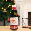 Festive snowman wine bottle cover with plaid pattern and black hat for Christmas decor - Snowman