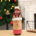 Christmas reindeer wine bottle cover in red knit fabric for festive dining table decor - Elk Style