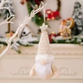 Christmas gnome pendant with knitted hat, white beard, and a golden glitter star - Beige