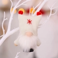 Creamy white knitted Christmas gnome ornament with red pom-pom ears and hanging string - White