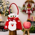Gestrickte Weihnachts-Geschenktüte mit 3D-Weihnachtsmann-Gesicht und weißen Schneeflocken - Weihnachtsmann