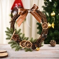 Handcrafted Christmas rattan wreath with pine cones and Merry Christmas ribbon decoration - Lemon Style