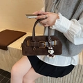 Donkerbruine suède vintage tas met lederen bies en schattige schnauzer hanger - Met Hanger / koffiekleur