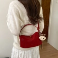 Chic red leather shoulder bag with a cute plush dog pendant for stylish women - Red with Pendant