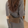 Minimalist dark brown half-moon shoulder bag in matte finish with a cute bear charm - Coffee With Rabbit Pendant