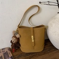 Ginger yellow bucket crossbody bag with a vintage lock and cute knitted rabbit charm - With Pendant / Caramel color