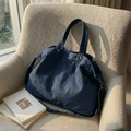 Deep blue denim tote bag with metal rivets and long shoulder strap for women - Dark Blue