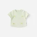 Light green cotton T-shirt for girls featuring sweet bow accents and a round neck - 80 / Green