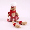 Poupée de pain d'épices de Noël en jupe à carreaux rouge et toque de chef blanche - Style Homme à Longues Jambes