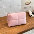 Pink quilted nylon pouch with cross-stitch texture and secure zipper closure for women - Pink