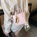 Pink vintage bucket bag with wooden bead charm and crossbody strap for women - Pink