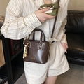 Vintage dark brown matte bucket bag with beaded charm and adjustable shoulder strap - Brown