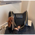 Detail of black textured PU leather crossbody bag with gold chain and cute bear charm - With Charm / Black