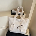 Creamy white plush tote bag featuring cute cartoon puppy embroidery and soft faux fur - Off White