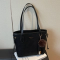 Classic black faux leather tote bag with gold logo and brown pom-pom charm detail - With Charm / Black
