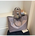 Detail of lilac nylon tote bag with wide adjustable shoulder straps and waterproof texture - Rose Gold