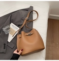 Brown litchi grain leather bucket bag with silver twist lock and adjustable shoulder strap - No Pendant / Apricot