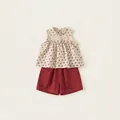 Ensemble d'été pour fille avec haut floral sans manches à volants et short rouge - 140 / Abricot Floral